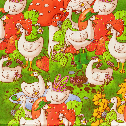Close up of the In the Geese Garden Stretch Twill Fabric. The green base fabric features white geese amongst giant strawberries, mushrooms, pink, yellow and white flowers, and ponds. Inspired by gardening and cottagecore fashion the design features geese with mushroom hats, green wellies, flower crowns, frog hats, fairy wings and a medieval mace.