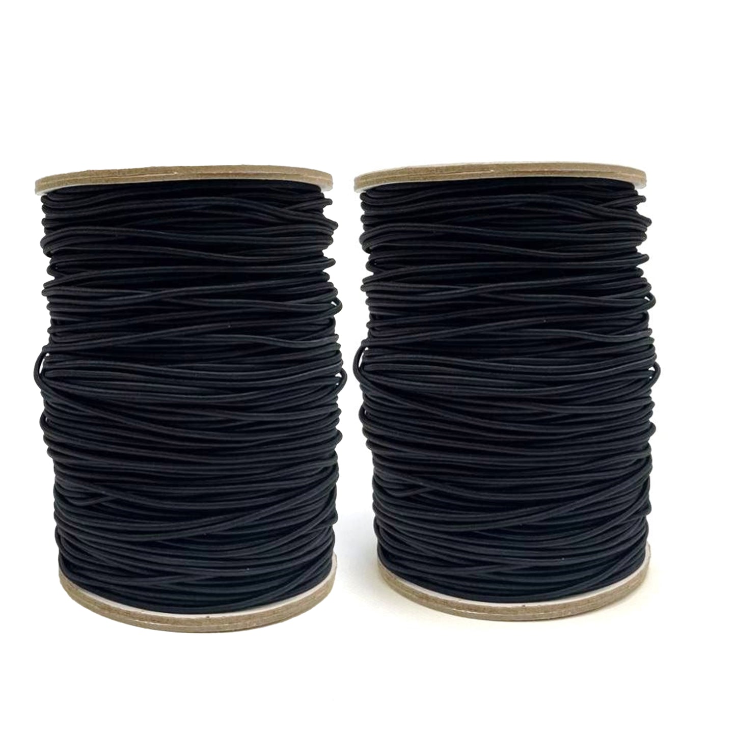 A wide shot of two spools of cord stood together showing the thickness of the fabric
