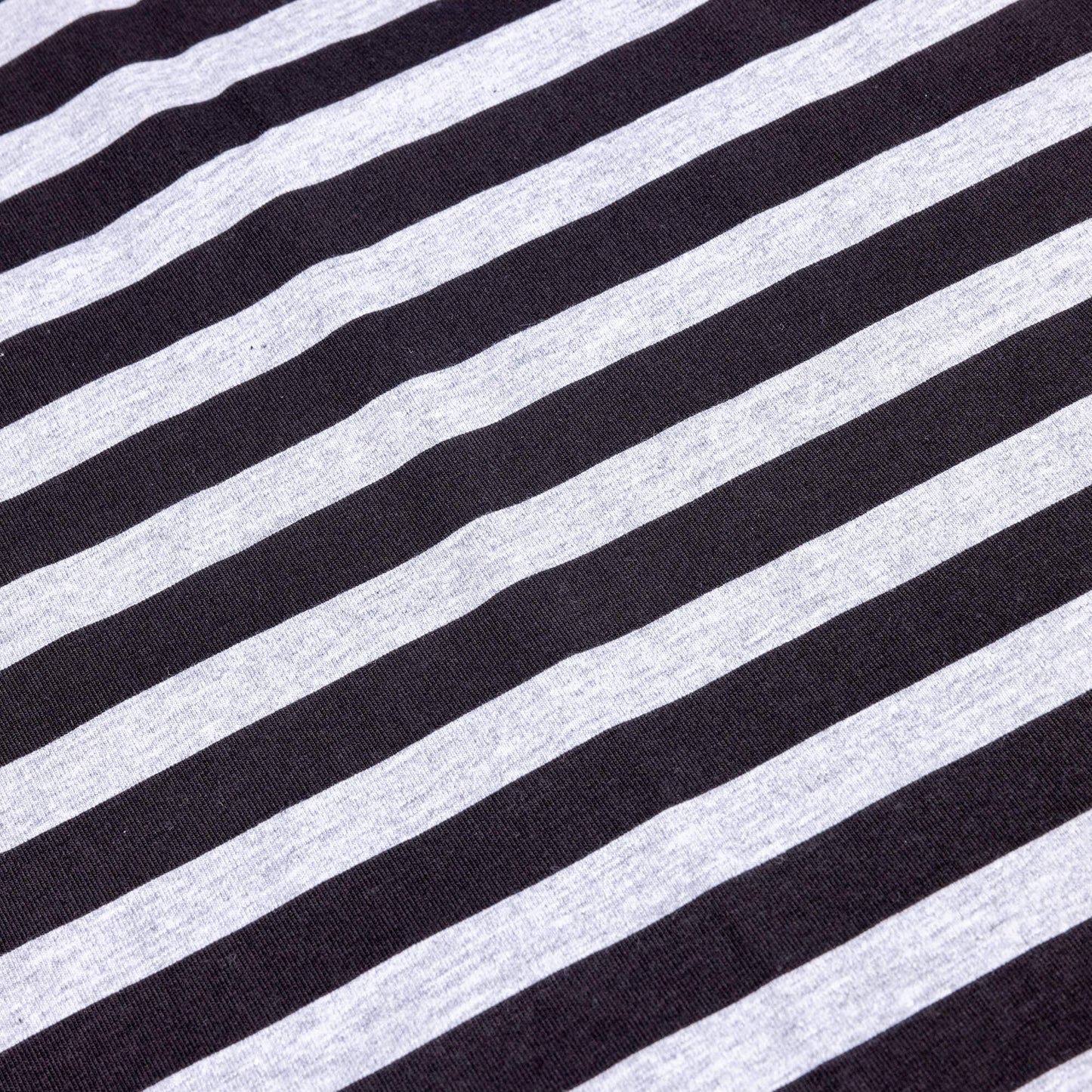 horizontal view of a black and grey striped light t- shirt fabric