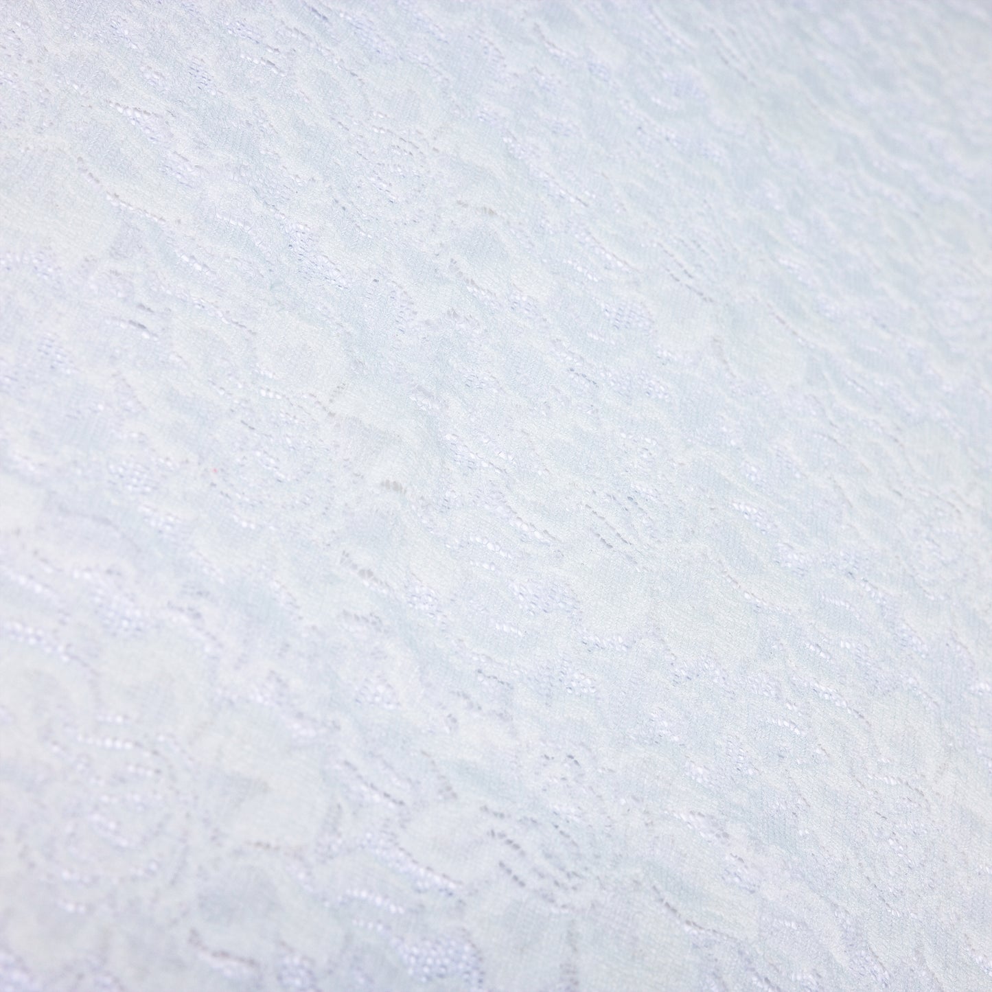 Ivory white floral stretch lace fabric for sewing and clothing projects