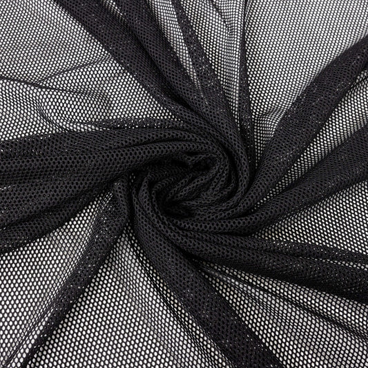 Black Fishnet Airtex Mesh Stretch Fabric swirled and folded into the centre. The black mesh fishnet fabric has 2/3 mm holes and has natural stretch from the polyester.