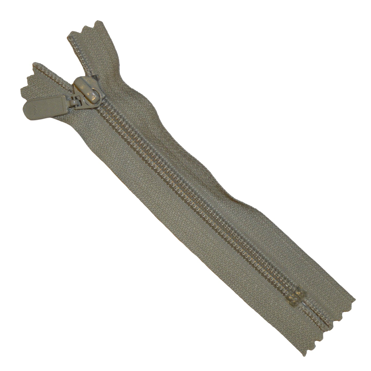 A putty coloured zip on a white background