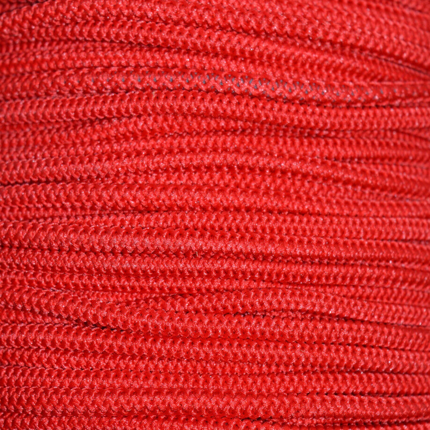 A very close shot of bright red 4mm thickness bungee cord