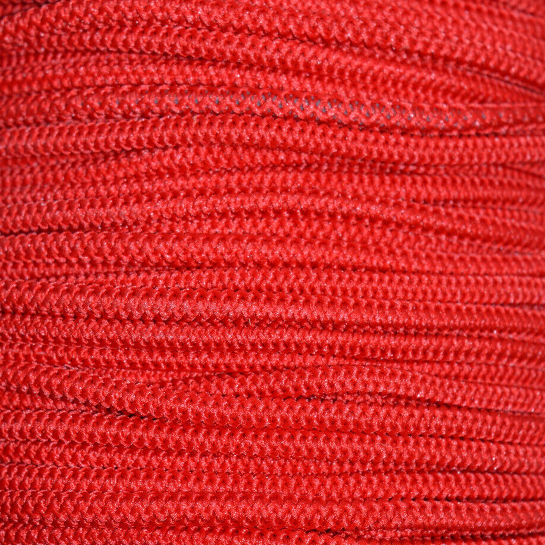 A very close shot of bright red 4mm thickness bungee cord