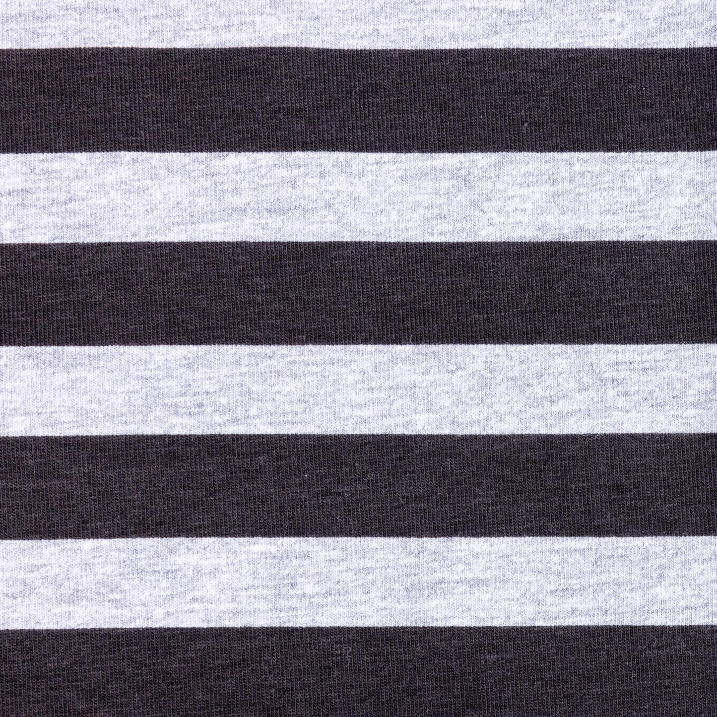 close up of black and grey fabric on a stretch jersey base