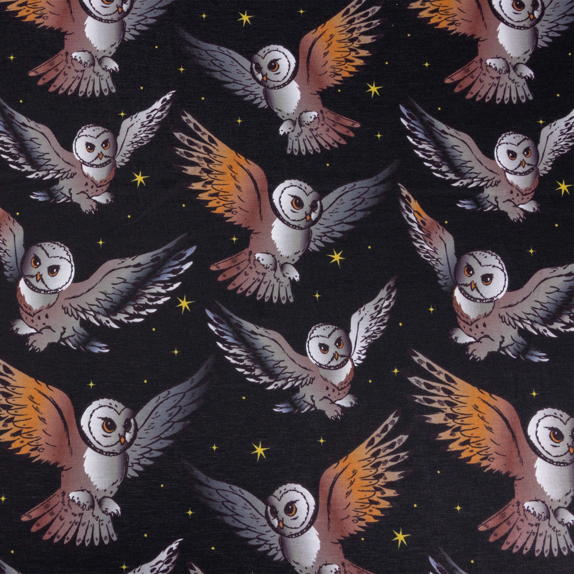 A look at the What a hoot stretch jersey fabric featuring barn owls in flight with black background and yellow twinkly stars