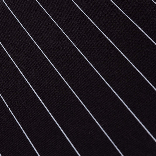 A close up of the black and white pin stripe fabric