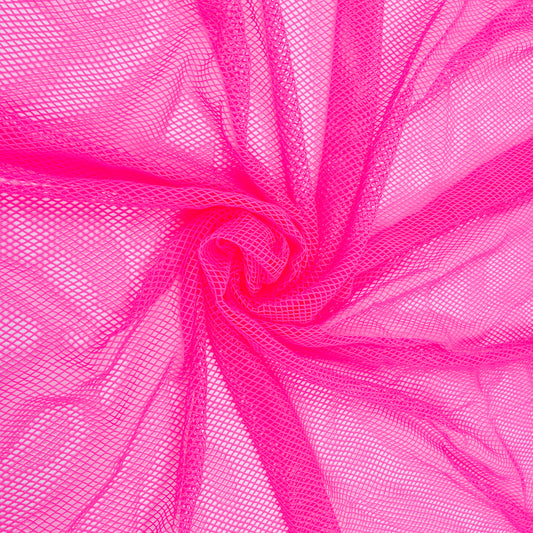 A bright Barbie pink mesh fishnet fabric swirled and twisted 