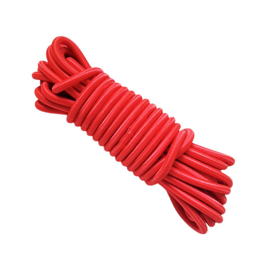 A red coiled up bright red bungee rope elastic shock cord it is 4mm in thickness