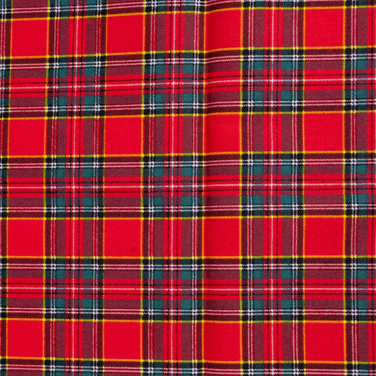 A close up of Red tartan fabric  showing yellow, white, green and navy against a red background